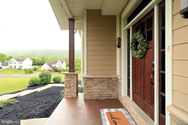 441 Millgate Rd, Bellefonte, PA 16823 - entrance to property featuring a residential view, a porch, and stone siding