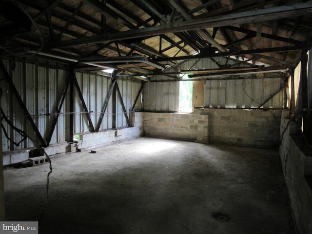 interior space featuring concrete block wall