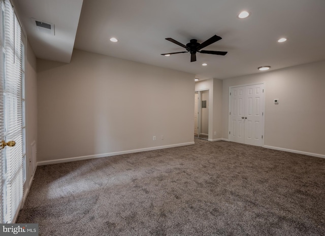 carpeted empty room with ceiling fan, recessed lighting, and baseboards