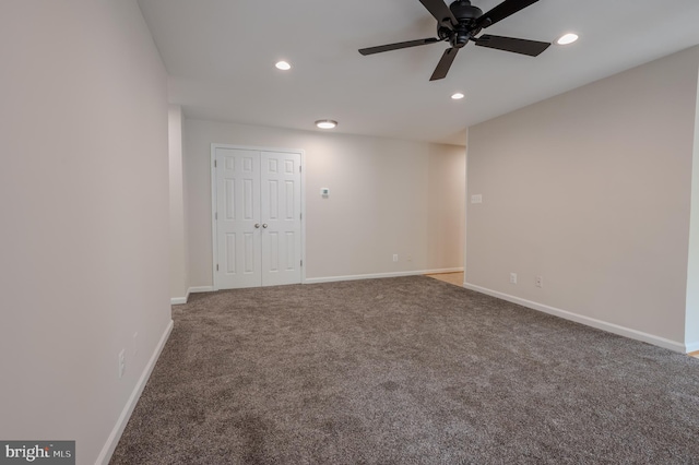 spare room with recessed lighting, ceiling fan, carpet floors, and baseboards
