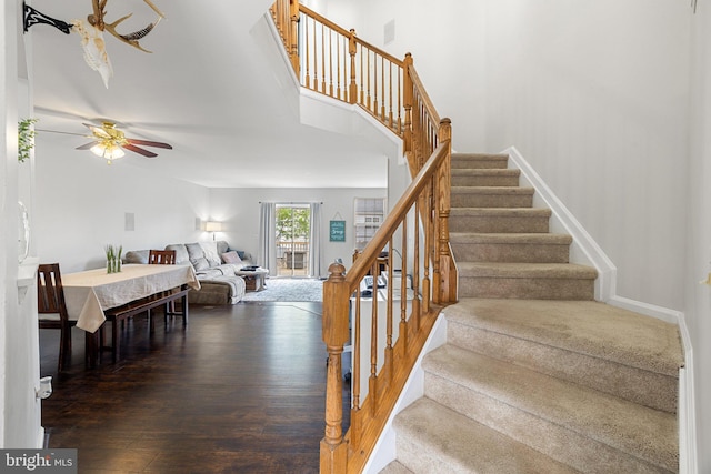 13215 Golders Green Pl, Bristow, VA 20136 - staircase with a ceiling fan and wood finished floors