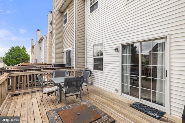 13215 Golders Green Pl, Bristow, VA 20136 - wooden terrace with outdoor dining space