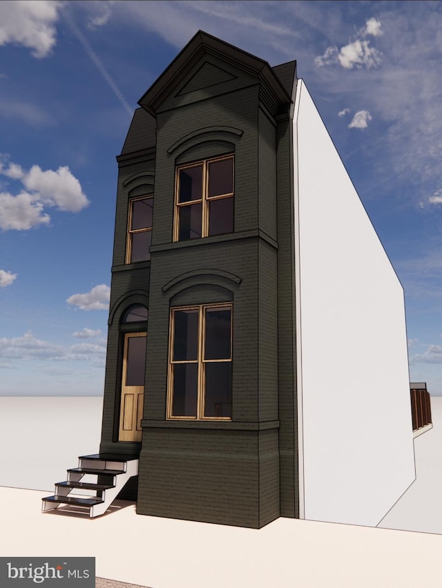 exterior space featuring brick siding and entry steps