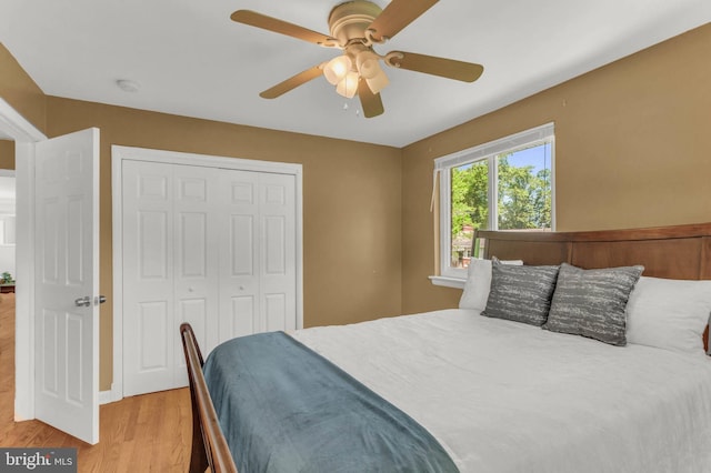 2300 Foster Pl, Temple Hills, MD 20748 - bedroom with light wood finished floors, a closet, and ceiling fan