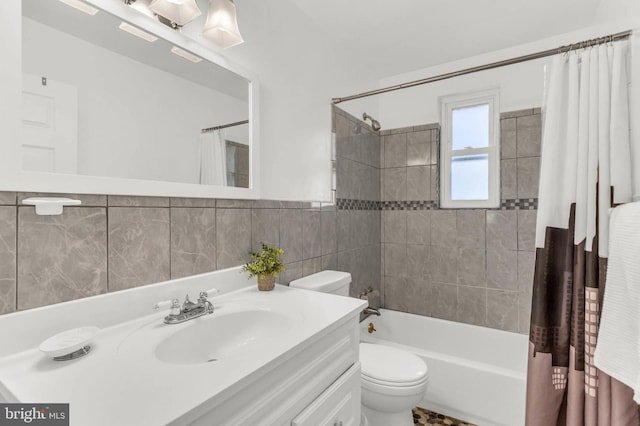 2300 Foster Pl, Temple Hills, MD 20748 - full bathroom with toilet, shower / tub combo with curtain, vanity, and tile walls