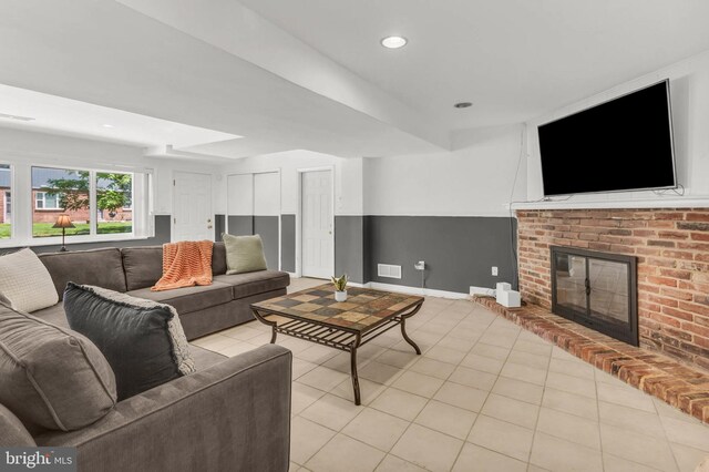 2300 Foster Pl, Temple Hills, MD 20748 - living area with light tile patterned floors, a brick fireplace, baseboards, and recessed lighting