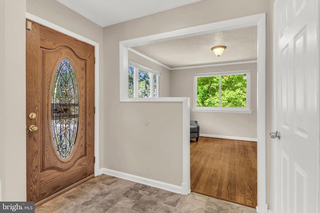 2300 Foster Pl, Temple Hills, MD 20748 - foyer entrance with baseboards and crown molding