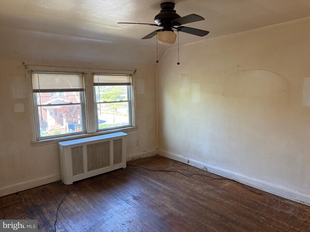 4333 Pimlico Rd, Baltimore, MD 21215 - unfurnished room with baseboards, a ceiling fan, radiator heating unit, and hardwood / wood-style floors