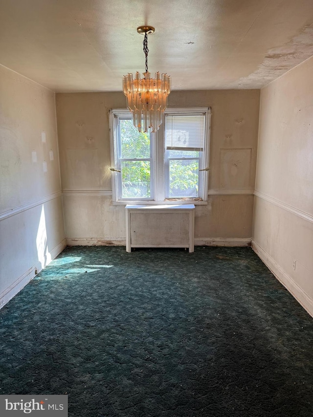 4333 Pimlico Rd, Baltimore, MD 21215 - unfurnished dining area with carpet flooring, baseboards, an inviting chandelier, and radiator heating unit