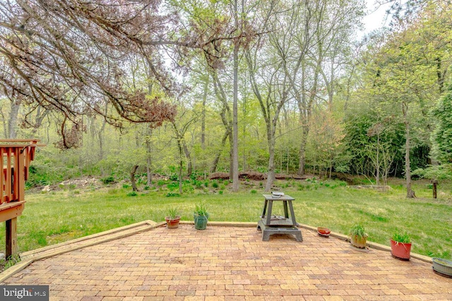 7 Teak Ct, Cherry Hill, NJ 08003 - view of patio featuring a wooded view