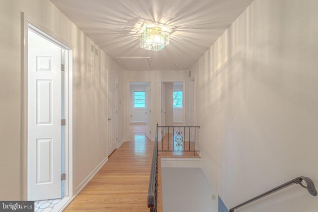 7 Teak Ct, Cherry Hill, NJ 08003 - hallway with an upstairs landing, attic access, and light wood finished floors