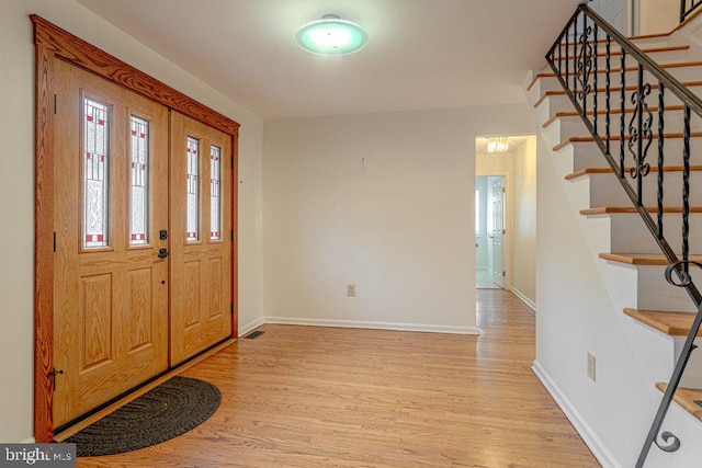 7 Teak Ct, Cherry Hill, NJ 08003 - foyer with stairway, wood finished floors, and baseboards