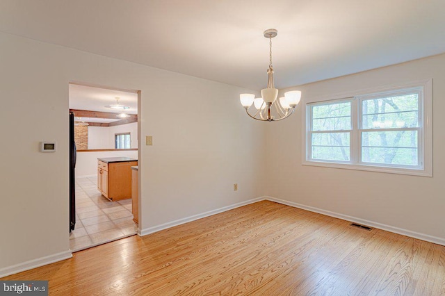 7 Teak Ct, Cherry Hill, NJ 08003 - unfurnished room featuring an inviting chandelier, visible vents, light wood-type flooring, and baseboards