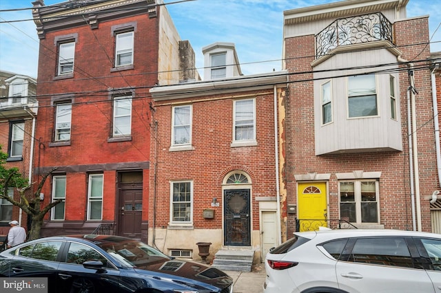 1130 N 3rd St, Philadelphia, PA 19123 - view of front facade with brick siding and entry steps