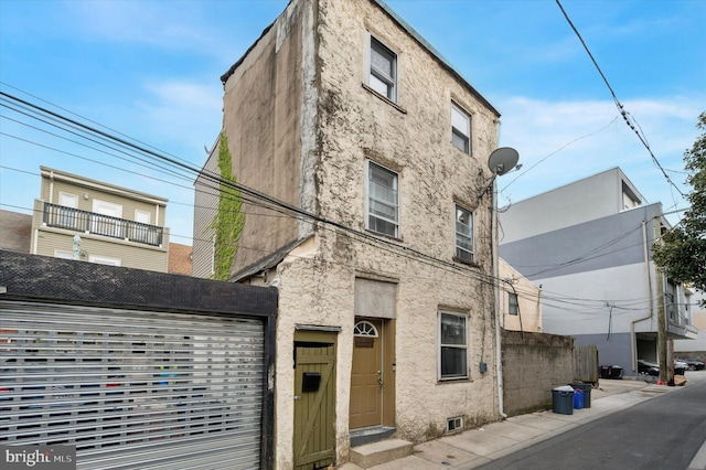 1130 N 3rd St, Philadelphia, PA 19123 - view of property featuring a garage