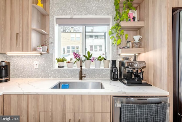 kitchen with light brown cabinetry, open shelves, modern cabinets, and stainless steel dishwasher