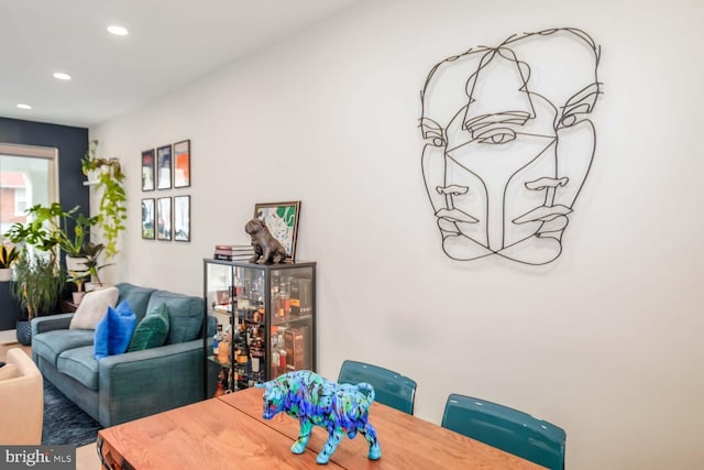 dining space featuring recessed lighting