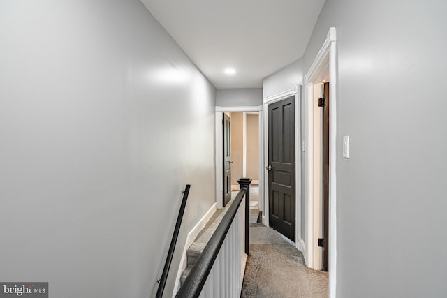 19 W 29th St, Wilmington, DE 19802 - hall with carpet flooring, an upstairs landing, and baseboards