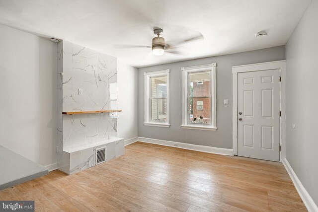 19 W 29th St, Wilmington, DE 19802 - foyer entrance featuring light wood finished floors, ceiling fan, and baseboards