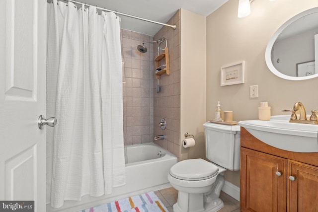 bathroom with tile patterned floors, shower / bathtub combination with curtain, toilet, and vanity