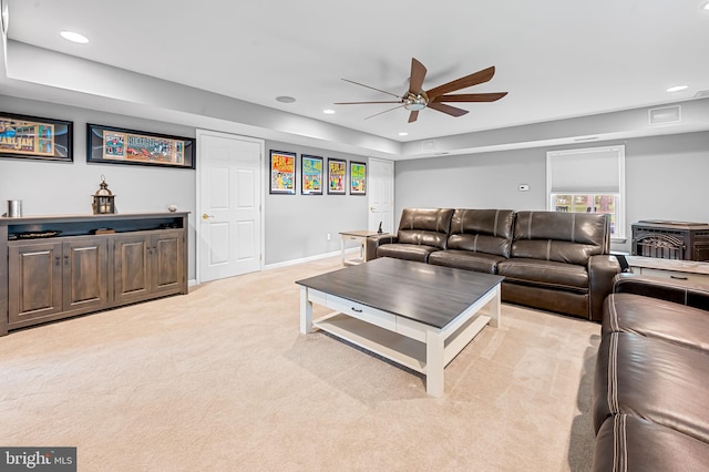 living room featuring recessed lighting, light carpet, and ceiling fan