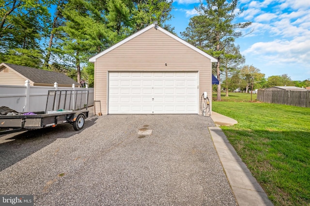 detached garage with fence