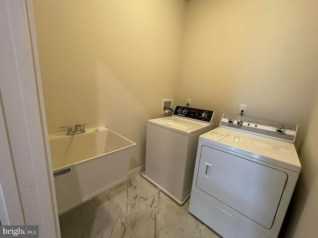 937 Swinehart, Boyertown, PA 19512 - laundry area featuring a sink, washer and clothes dryer, laundry area, marble finish floor, and baseboards