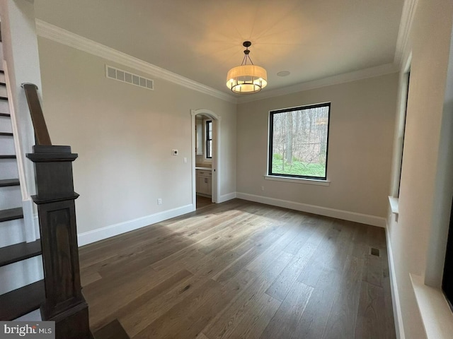 937 Swinehart, Boyertown, PA 19512 - interior space with wood finished floors, arched walkways, ornamental molding, baseboards, and visible vents