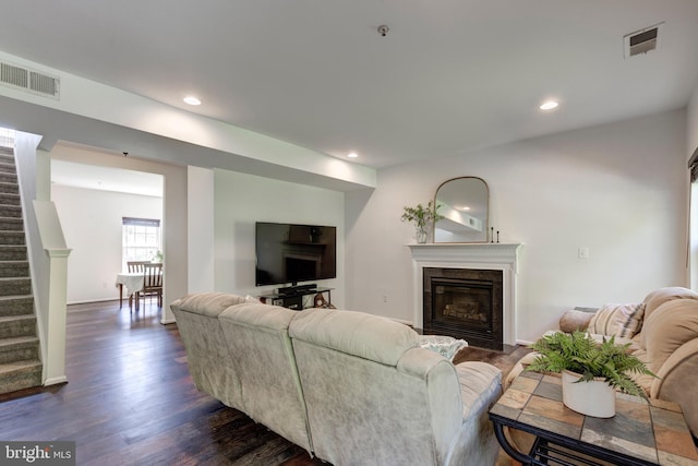 3560 Sherwin Dr, Manchester, MD 21102 - living area featuring dark wood-style flooring, stairway, a high end fireplace, recessed lighting, and baseboards