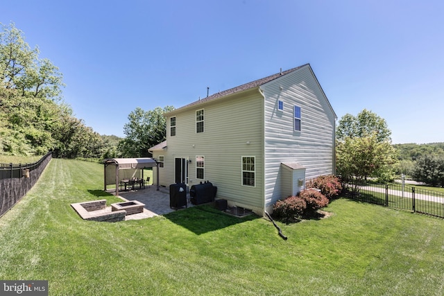 3560 Sherwin Dr, Manchester, MD 21102 - back of property with a fire pit and a patio