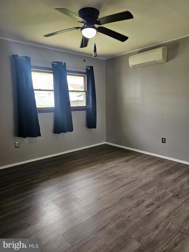 56 Coral Ln, Levittown, PA 19055 - unfurnished room featuring dark wood-style floors, a wall mounted air conditioner, ceiling fan, and baseboards