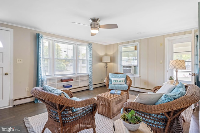living room with crown molding, ceiling fan, baseboard heating, and cooling unit