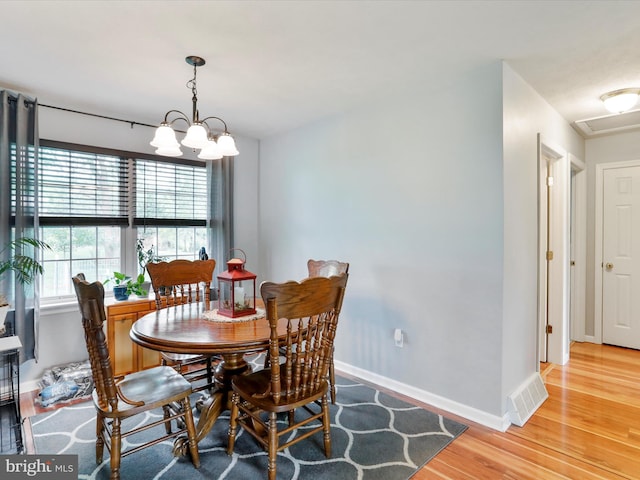 29 Blueberry Ln, Keyser, WV 26726 - dining room featuring a chandelier, light wood-style flooring, baseboards, and visible vents