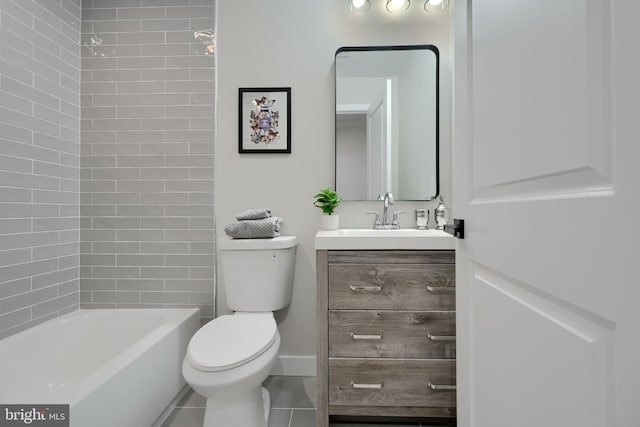 full bathroom with toilet and vanity