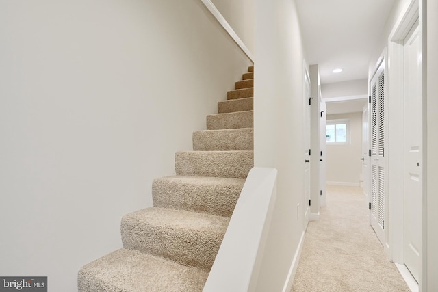stairs featuring recessed lighting, carpet flooring, and baseboards