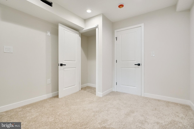 interior space with recessed lighting, carpet floors, and baseboards