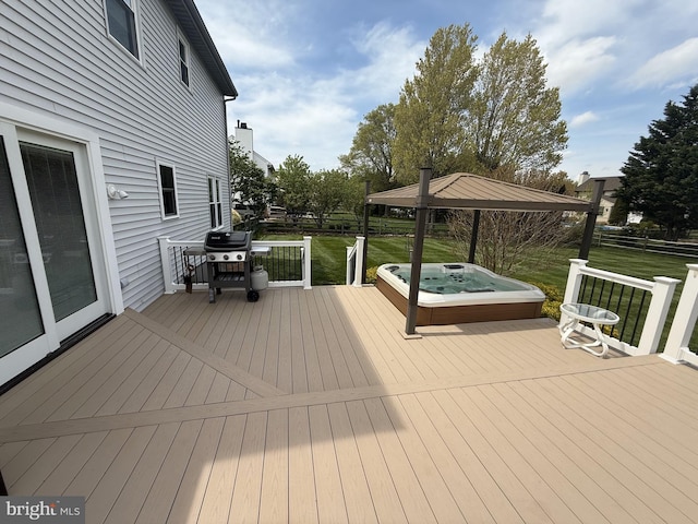 deck featuring a gazebo, grilling area, a yard, and an outdoor hot tub
