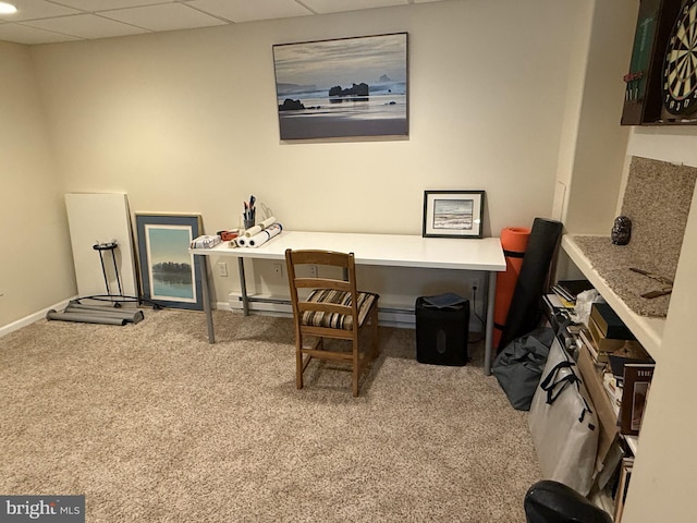 office featuring baseboards, a baseboard heating unit, carpet, and a paneled ceiling