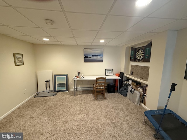 interior space with baseboards, recessed lighting, carpet floors, and a drop ceiling