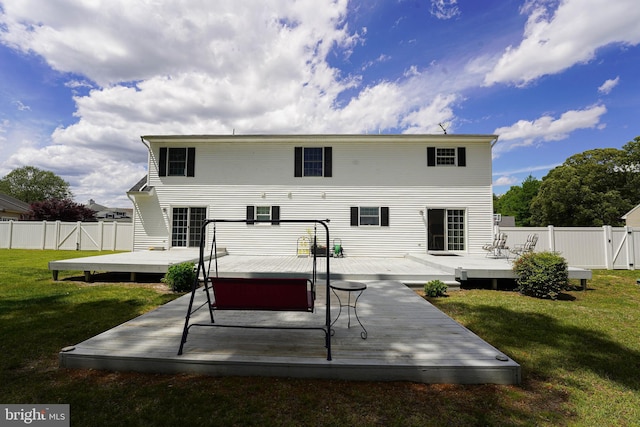 30085 Haymarket Ct, Salisbury, MD 21804 - back of property featuring a deck, a jacuzzi, and a gate