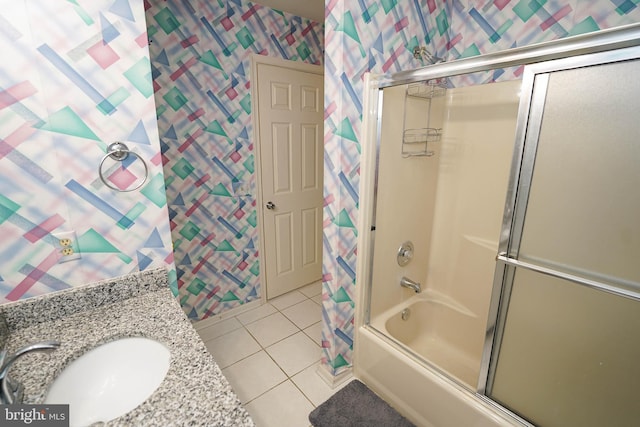 30085 Haymarket Ct, Salisbury, MD 21804 - full bathroom featuring a sink, wallpapered walls, tile patterned flooring, and bath / shower combo with glass door