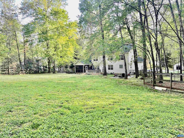 view of yard featuring fence