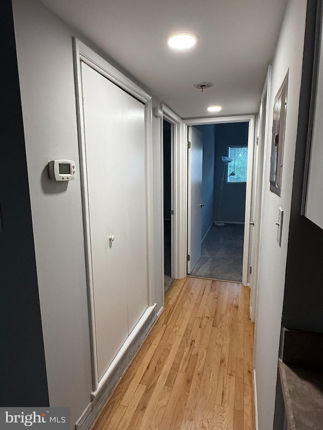 hall featuring recessed lighting and light wood finished floors