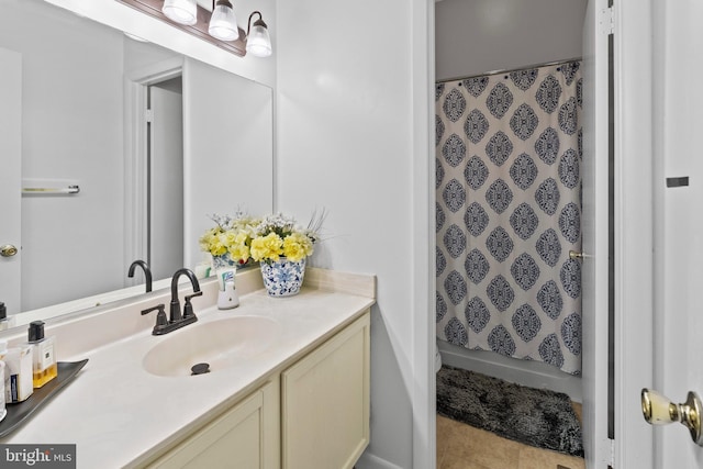 8101 Greenspring Way Unit 8101-E, Owings Mills, MD 21117 - full bath with curtained shower, tile patterned flooring, and vanity