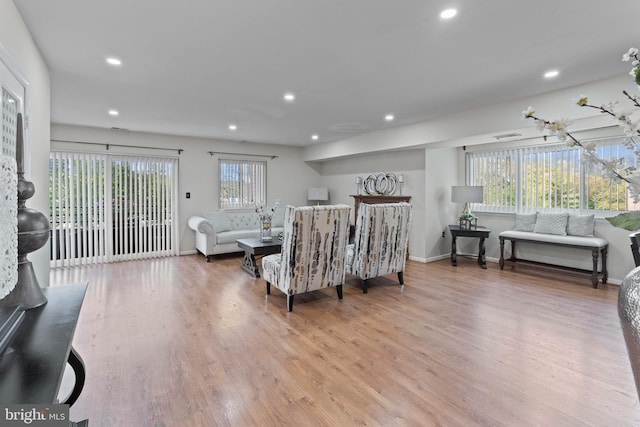 8101 Greenspring Way Unit 8101-E, Owings Mills, MD 21117 - living area with recessed lighting, wood finished floors, and baseboards