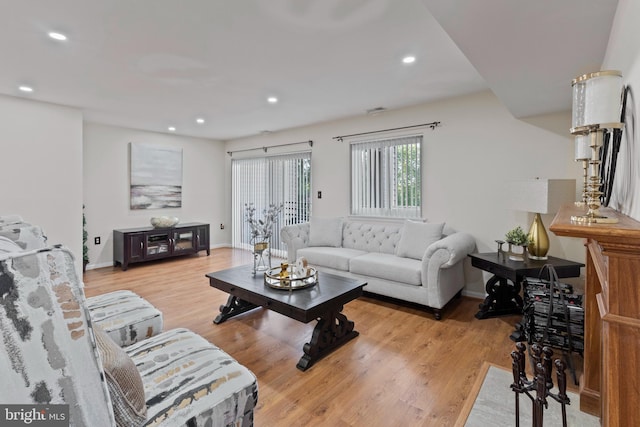8101 Greenspring Way Unit 8101-E, Owings Mills, MD 21117 - living area featuring baseboards, recessed lighting, visible vents, and light wood finished floors
