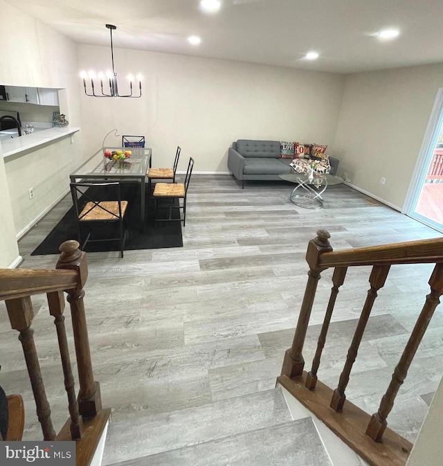 20002 Apperson Pl, Germantown, MD 20876 - interior space featuring baseboards, recessed lighting, wood finished floors, and a notable chandelier