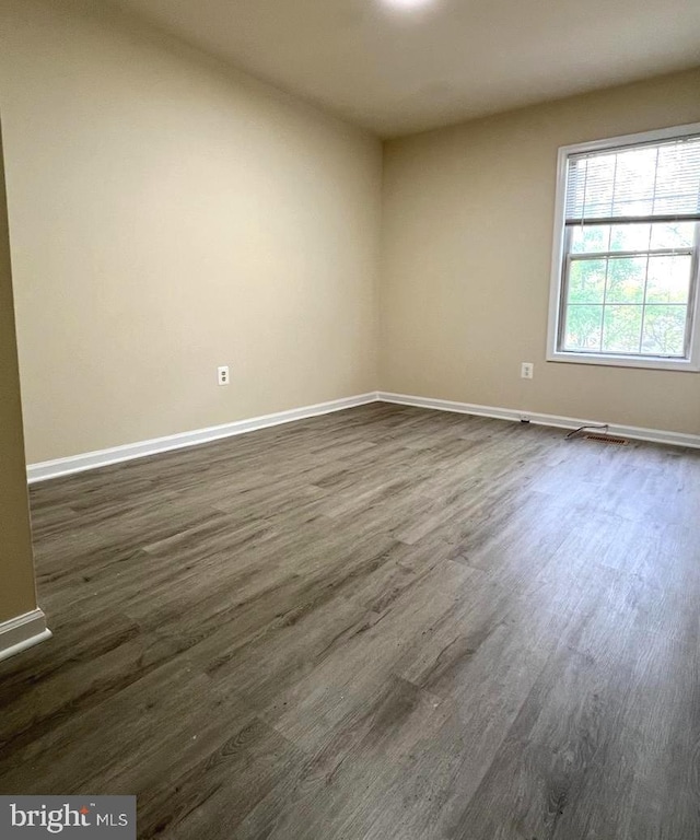 20002 Apperson Pl, Germantown, MD 20876 - unfurnished room with baseboards and dark wood-style flooring