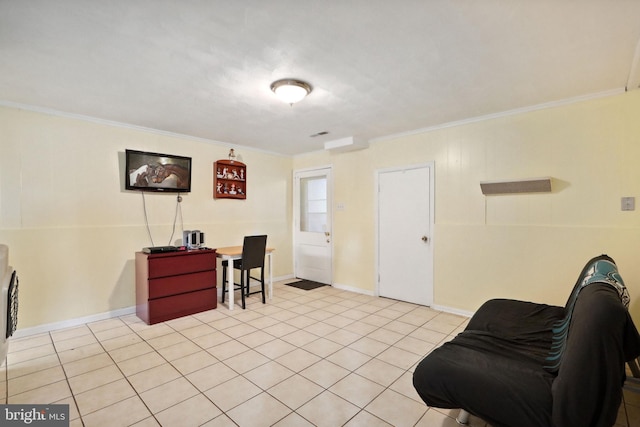 interior space with baseboards, ornamental molding, and light tile patterned flooring