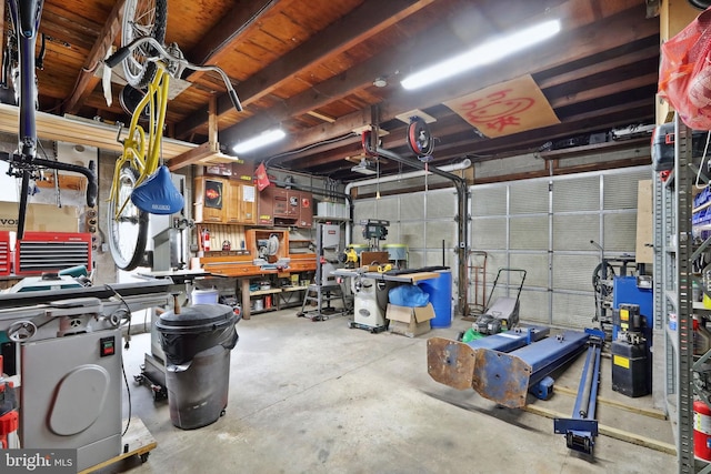 garage featuring a workshop area